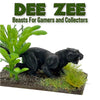 Model panther figurine with green plants on a white background, featuring 'DEE ZEE' branding.