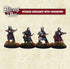 A set of four miniature figures representing veteran sergeants with crossbows, from the Baron's War line, positioned on a grassy base.