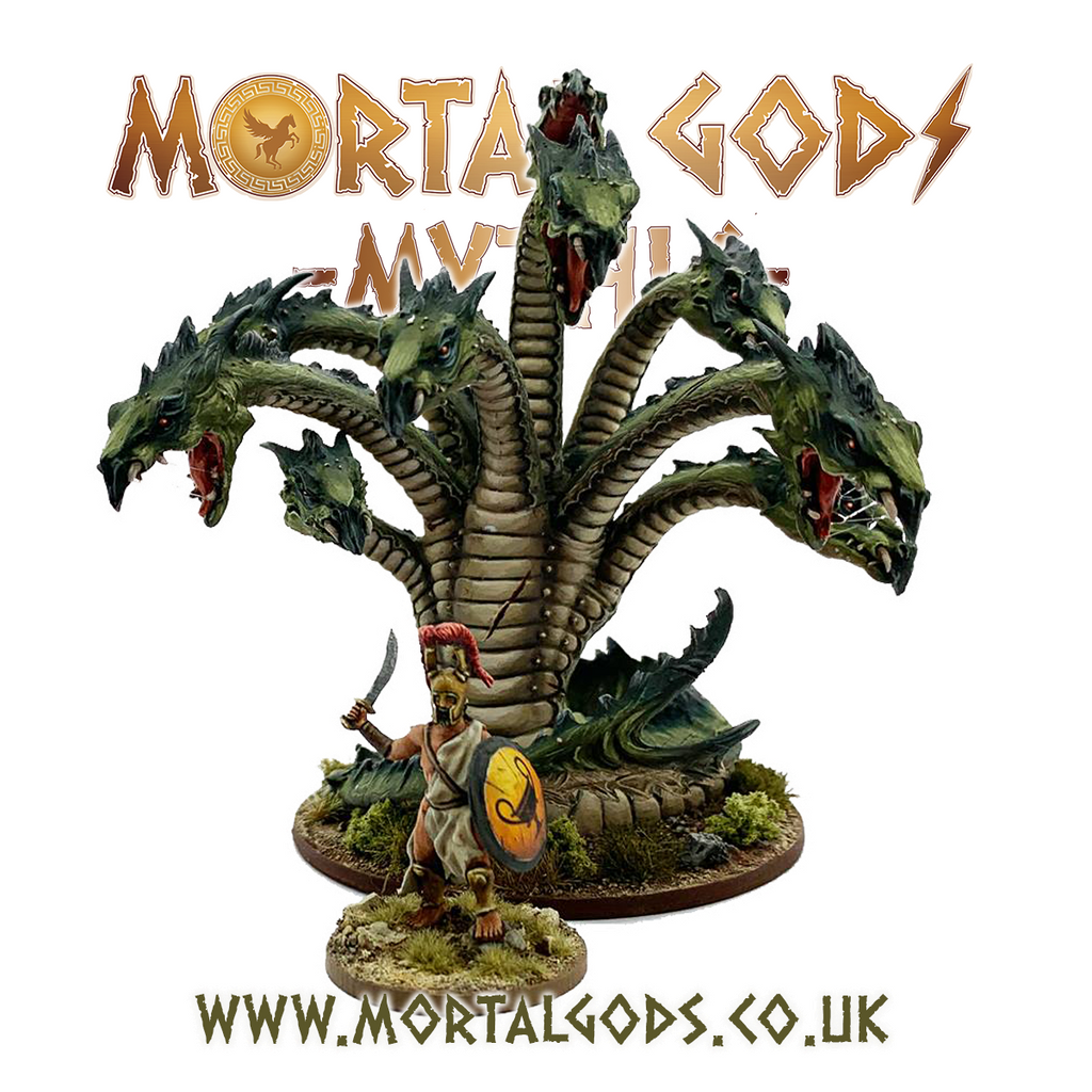 A resin miniature of a multi-headed hydra from Greek mythology, positioned on a round MDF base, with the Mortal Gods brand logo at the top.